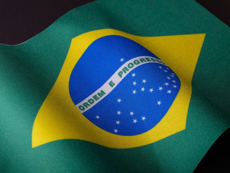 the flag of brazil is waving in the wind
